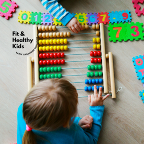 Young girl playing with a counting toy
