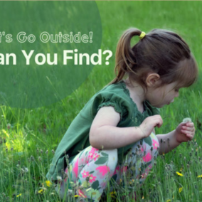 Little girl kneeling in grass