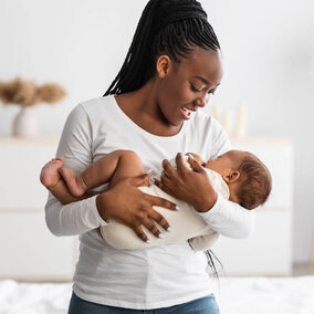 Woman holding infant