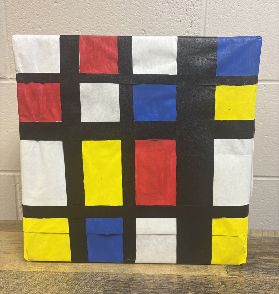 Square with red, yellow, blue and white squares outlined in black