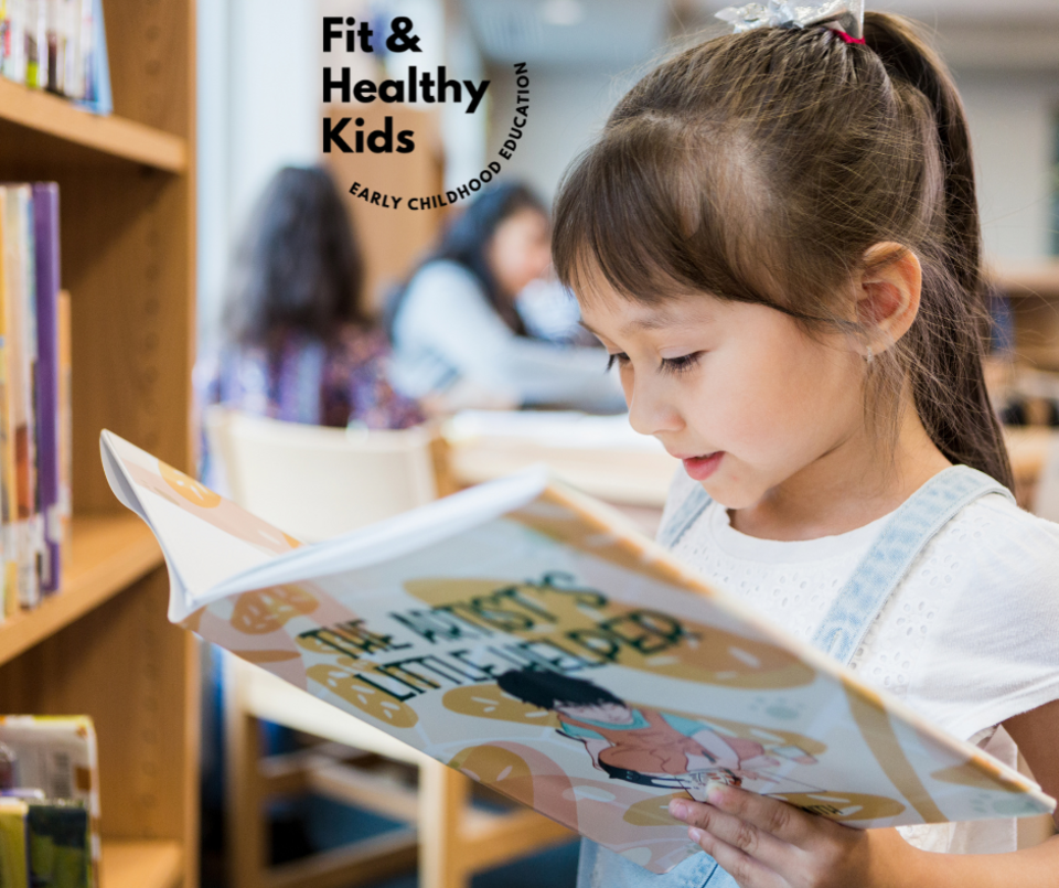 Young girl reading a book