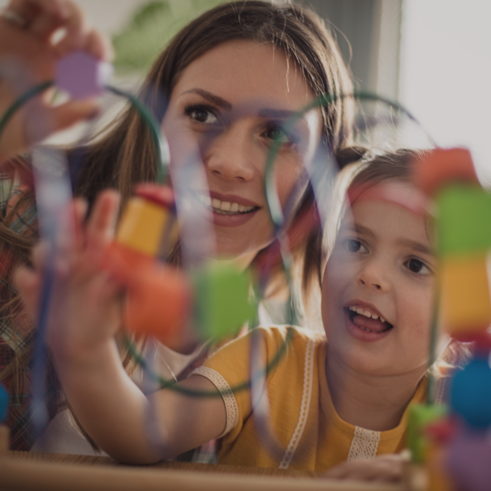 Adult and child playing 