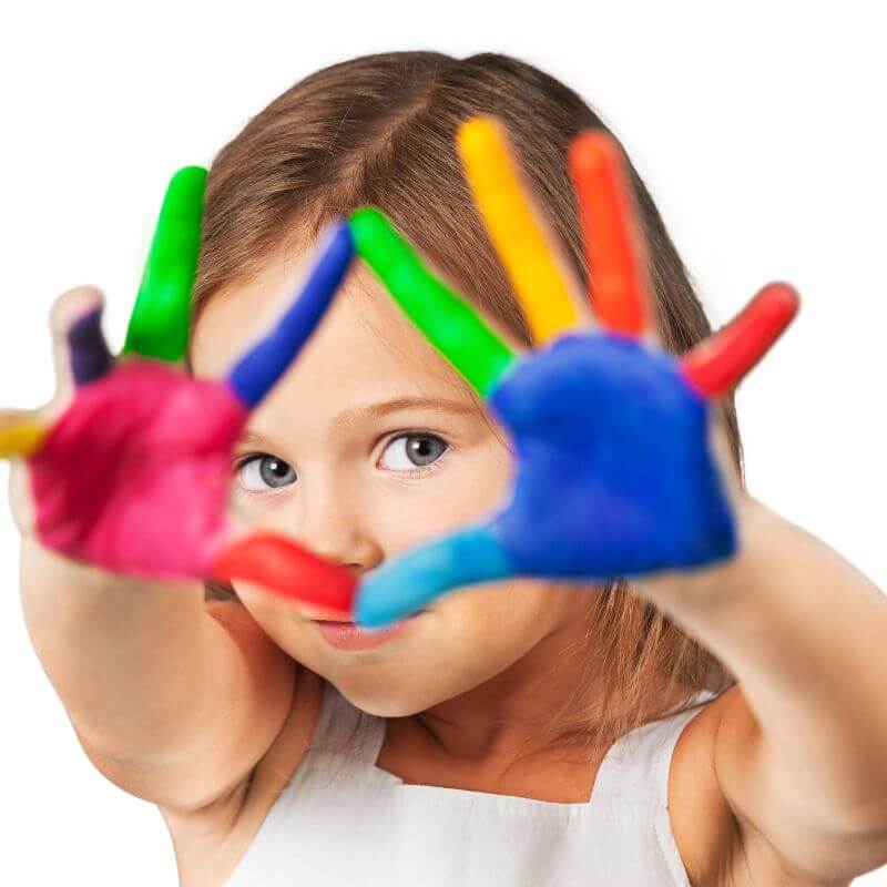 Child's hands with colored paint on them